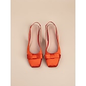 abordables Demoiselle d&amp;#39;honneur-Chaussures plates bleu clair à nœud pour femmes, élégantes et confortables, idéales pour les demoiselles d'honneur lors de mariages en plein air dans un jardin.