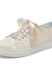 preiswerte Braut-Braut-Spitzen-Hochzeits-Sneaker – elegante elfenbeinfarbene Low-Top-Sneaker mit Satinband-Schnürsenkeln und Strass-Details für Bräute und besondere Anlässe