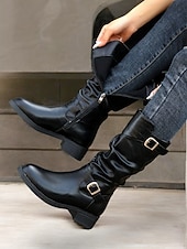olcso Slouch Boots-fekete, lábszárközépig érő, lenge női csizma krokk-dombornyomott részletekkel és arany csatos díszítéssel – lezser és stílusos dizájn