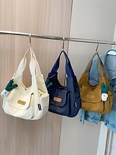 olcso Kézitáskák és bevásárlótáskák-alkalmi mustárvászon táska elülső zsebbel és imádnivaló plüss bájjal - tökéletes a mindennapi stílushoz