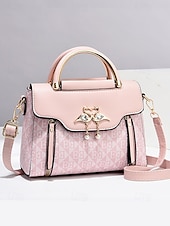 levne Kabelky a tote tašky-elegantní dámská béžová crossbody kabelka – luxusní monogramové provedení s přívěskem srdce a horní rukojetí