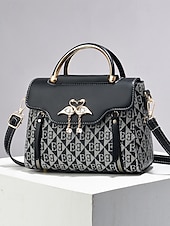 levne Kabelky a tote tašky-elegantní dámská béžová crossbody kabelka – luxusní monogramové provedení s přívěskem srdce a horní rukojetí
