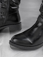 olcso Slouch Boots-fekete, lábszárközépig érő, lenge női csizma krokk-dombornyomott részletekkel és arany csatos díszítéssel – lezser és stílusos dizájn
