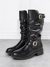 olcso Slouch Boots-fekete, lábszárközépig érő, lenge női csizma krokk-dombornyomott részletekkel és arany csatos díszítéssel – lezser és stílusos dizájn