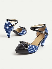 halpa 1950-luvun retrotyyli-Naisten tummansiniset pilkulliset 1950-luvun vintage-nilkkaremmillä varustetut korkokengät, joissa musta rusetti ja retrokorko, pin-up-tyyliin, teekutsuille ja erityistilaisuuksiin