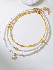 abordables Collar de mujer-Conjunto de collar y pulsera tobillera en capas estilo playa para mujer con dijes de estrellas de mar y conchas, diseño de cuentas doradas y blancas, adecuado para vacaciones de verano, estilo casual y bohemio.