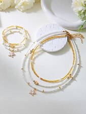 abordables Collar de mujer-Conjunto de collar y pulsera tobillera en capas estilo playa para mujer con dijes de estrellas de mar y conchas, diseño de cuentas doradas y blancas, adecuado para vacaciones de verano, estilo casual y bohemio.