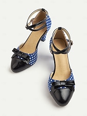 halpa 1950-luvun retrotyyli-Naisten tummansiniset pilkulliset 1950-luvun vintage-nilkkaremmillä varustetut korkokengät, joissa musta rusetti ja retrokorko, pin-up-tyyliin, teekutsuille ja erityistilaisuuksiin