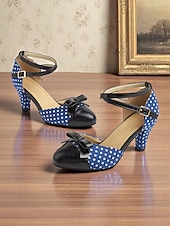 halpa 1950-luvun retrotyyli-Naisten tummansiniset pilkulliset 1950-luvun vintage-nilkkaremmillä varustetut korkokengät, joissa musta rusetti ja retrokorko, pin-up-tyyliin, teekutsuille ja erityistilaisuuksiin