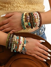 economico Bracciale da donna-Set di braccialetti con ciondoli a strati con perline boho da donna: bracciali in legno, turchese e pelle scamosciata in stile vintage con ciondoli a forma di foglia e geometrici, ideali per abbigliamento casual, festival e vacanze al mare