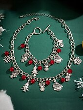 abordables Collar de mujer-Conjunto de collar y pulsera navideños para mujer: cadena plateada con cuentas rojas, colgantes de copo de nieve, árbol y regalo. Joyería festiva para fiestas y regalos.