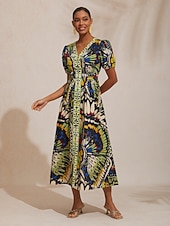  Maxikleid im Dschungel-Schmetterlings-Look aus luftigem Leinen.