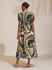  Maxikleid im Dschungel-Schmetterlings-Look aus luftigem Leinen.