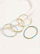 olcso Nyaralási kiegészítők-Női bohém rugalmas gyöngyös karkötő szett, 4 karkötő, gyöngyös kivitelben arany díszítéssel, tökéletes tengerparti nyaraláshoz és mindennapi viseletre