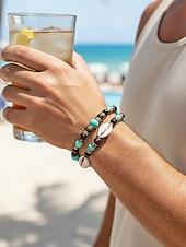 economico Gioielli da uomo-Set di due bracciali da uomo in stile boho, con perline di legno, turchese e conchiglia, perfetti per le vacanze al mare e per uno stile casual quotidiano.