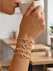 economico Bracciale da donna-Set di 4 bracciali da donna in lega, stile bohémien, impilabili, perfetti per le vacanze al mare, l'uso quotidiano e gli outfit estivi.