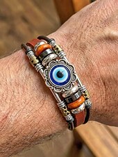 abordables Accessoires de vacances-Bracelet manchette pour homme en cuir turquoise avec tête de mort et détails métalliques, style bohème western, parfait pour une tenue décontractée au quotidien.