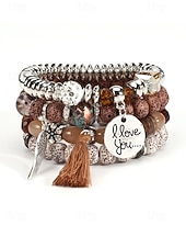 preiswerte Urlaubszubehör-Mehrlagiges Perlenarmband-Set im Boho-Stil für Damen – farbenfrohe Armbänder mit Quaste und Flügelanhänger für Freizeit und Strand.