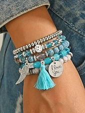 preiswerte Urlaubszubehör-Mehrlagiges Perlenarmband-Set im Boho-Stil für Damen – farbenfrohe Armbänder mit Quaste und Flügelanhänger für Freizeit und Strand.