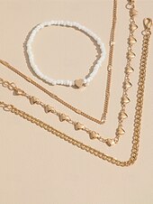 voordelige Damesarmband-Dames enkelbandjesset van 4 stuks in boho-stijl, goudkleurige legering enkelbandjes met hartvormige bedeltjes en witte kralen, zomerse strandvakantie sieraden voor vrouwen