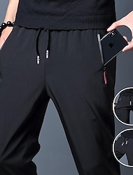 Herren Hose Hosen Freizeithose Stretchhose Kordelzug Elastische Taille Tasche mit Reißverschluss Feste Farbe Schnelltrocknend Täglich Strassenmode Klassisch Casual / sportlich Schwarz Blau