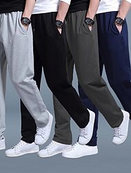 Hombre Pantalones de Deporte Persona que practica jogging Pantalones casuales Pantalones deportivos de pierna recta Correa Cintura elástica Pierna recta Plano Exterior Noche Moda Ropa de calle Negro