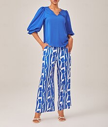 economico -elegante completo in stile vacanziero con top blu e pantaloni a gamba larga
