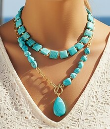 abordables -Collier ras-de-cou bohème turquoise à plusieurs rangs pour femme, orné de perles en fausse pierre et d'une chaîne en alliage doré avec un pendentif en forme de larme. Bijou idéal pour les vacances d'été à la plage ou au quotidien.