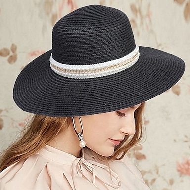 hat with high ponytail