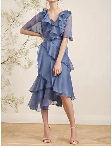 open back cocktail dress with sleeves