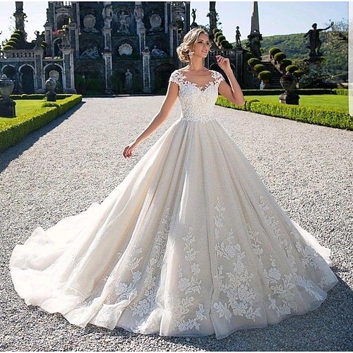 

Ball Gown Wedding Dresses Jewel Neck Chapel Train Lace Tulle Lace Over Satin Cap Sleeve Glamorous Illusion Detail with Appliques 2022