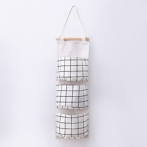 

self-produced and self-sold creative cotton and linen waterproof storage hanging bag 3-layer hanging pocket lattice type fabric door storage bag