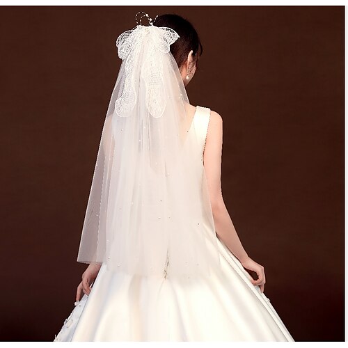 

3 strati Classico / Compleanno / Dolce Veli da sposa Velo corto (alle spalle) con Fiocco in satin / Colore Puro Tulle