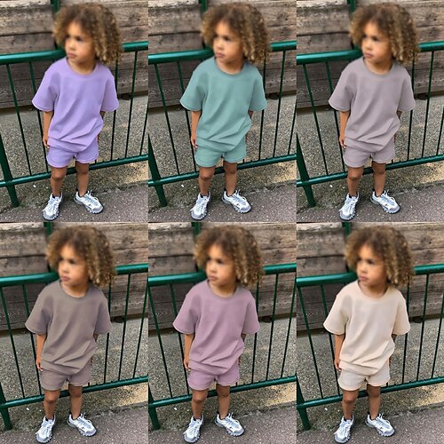 

2 pezzi Bambino Da ragazzo T-shirt e pantaloncini Vestito Tinta unica Manica corta Impostare Strada Fantastico Informale Estate 2-12 anni Viola Rosa polverosa Blu turchese
