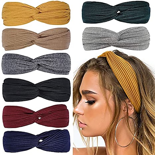 

le donne attorcigliano le fasce elastiche per capelli annodate boho incrociano il turbante