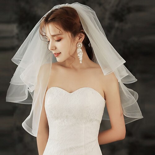 

Four-tier Luxury / Sweet Wedding Veil Elbow Veils with Pure Color 27.56 in (70cm) Tulle