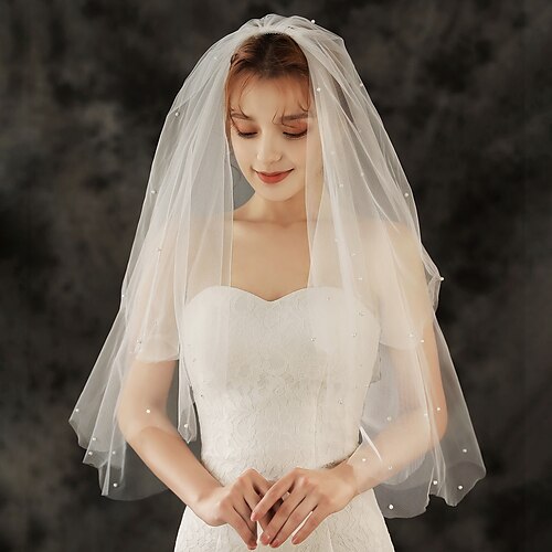 

Two-tier Luxury / Sweet Wedding Veil Elbow Veils with Faux Pearl / Pure Color / Splicing 33.46 in (85cm) Tulle