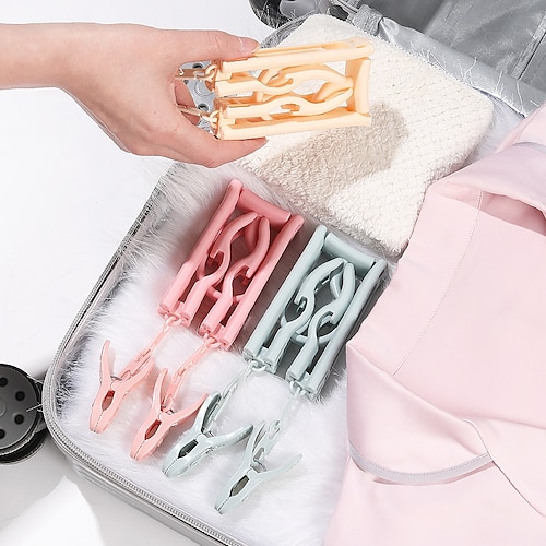 

Travel folding hangers for business trips hotel travel multi-purpose compact drying racks portable sock clips 4 Pack