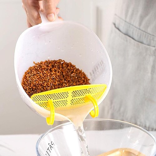 

Egg beater with scale and drain nozzle