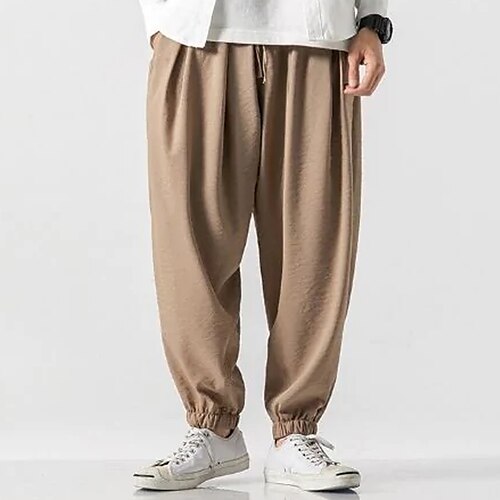

Per uomo Pareggiatore Pantaloni di lino Pantaloni Pantaloni estivi Tasche A cordoncino Vita elastica Liscio Comfort Traspirante Informale Giornaliero Abbigliamento di strada Misto cotone e lino Moda