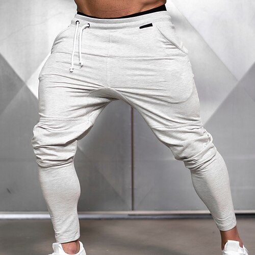 

Per uomo Pantaloni da jogging sottili Pantaloni della tuta Pantaloni da allenamento A cordoncino Vita elastica Liscio Caldo Esterno Per uscire Misto cotone Di tendenza Streetwear Nero Grigio chiaro