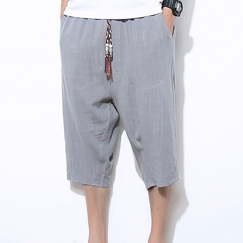 

Per uomo Pantaloncini di lino Pantaloncini estivi Pantaloncini casual Pantaloni modello Capri Tasche A cordoncino Vita elastica Liscio Esterno Giornaliero Per uscire Misto cotone e lino Di tendenza