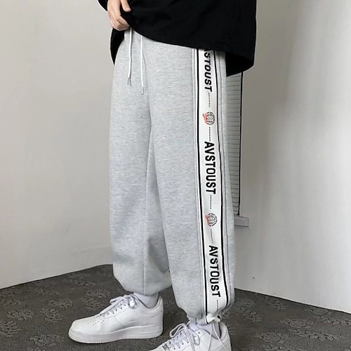 

Per uomo Pantaloni sportivi Pantaloni della tuta Pantaloni A cordoncino Coulisse sulle gambe Alfabetico Comfort Traspirante Giornaliero Per eventi Abbigliamento di strada Moda Classico Nero Grigio