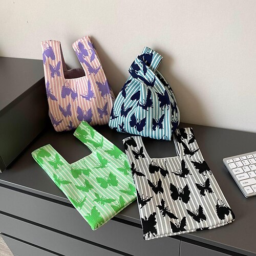 

Dame Poseveske Lerret stoffveske polyester Shopping Daglig Stor kapasitet Pustende Holdbar SKU-02 Grønn sommerfugl SKU-03 Rosa sommerfugl SKU-05 Sort sommerfugl på blå bakgrunn