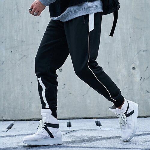 

Per uomo Pantaloni della tuta Pantaloni A cordoncino Liscio Comfort Traspirante Esterno Giornaliero Per uscire Di tendenza Streetwear Nero