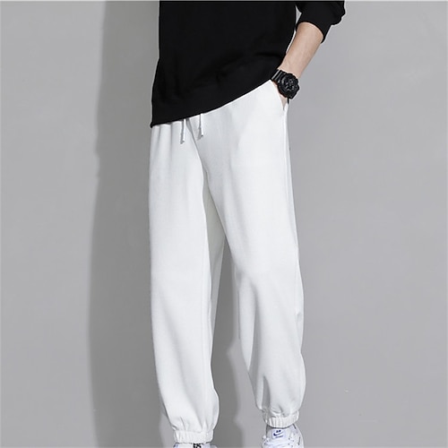 

Per uomo Pantaloni della tuta Pantaloni Tasche A cordoncino Vita elastica Liscio Comfort Morbido Informale Giornaliero Per eventi Sportivo Di tendenza Nero Bianco