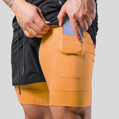 

Herre Atletisk shorts Aktiv shorts Casual shorts Lomme Snorer Elastisk midje عادي Komfort utendørs Daglig Ut på byen Mote Gatemote Svart Gul