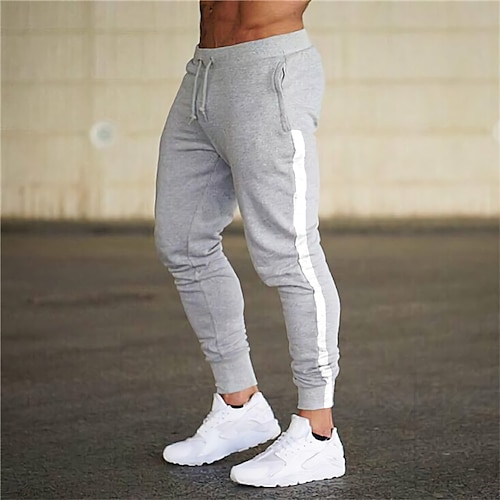 

Hombre Pantalones de Deporte Persona que practica jogging Pantalones Retazos Correa Cintura elástica Bloque de color Comodidad Transpirable Casual Diario Festivos Deportes Moda Ejercito verde Negro