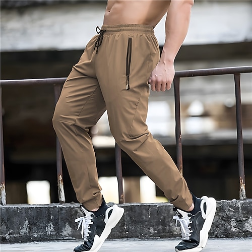 

Hombre Pantalones de Deporte Persona que practica jogging Pantalones Correa Cintura elástica Puño elástico Plano Comodidad Transpirable Casual Diario Festivos Deportes Moda Negro Azul Piscina