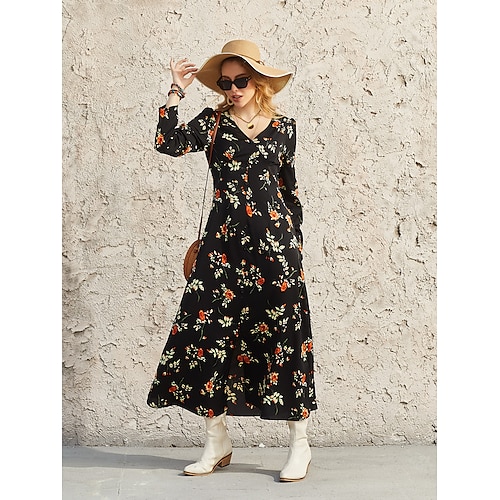 

o vestido maxi floral preto com decote em V e manga curta